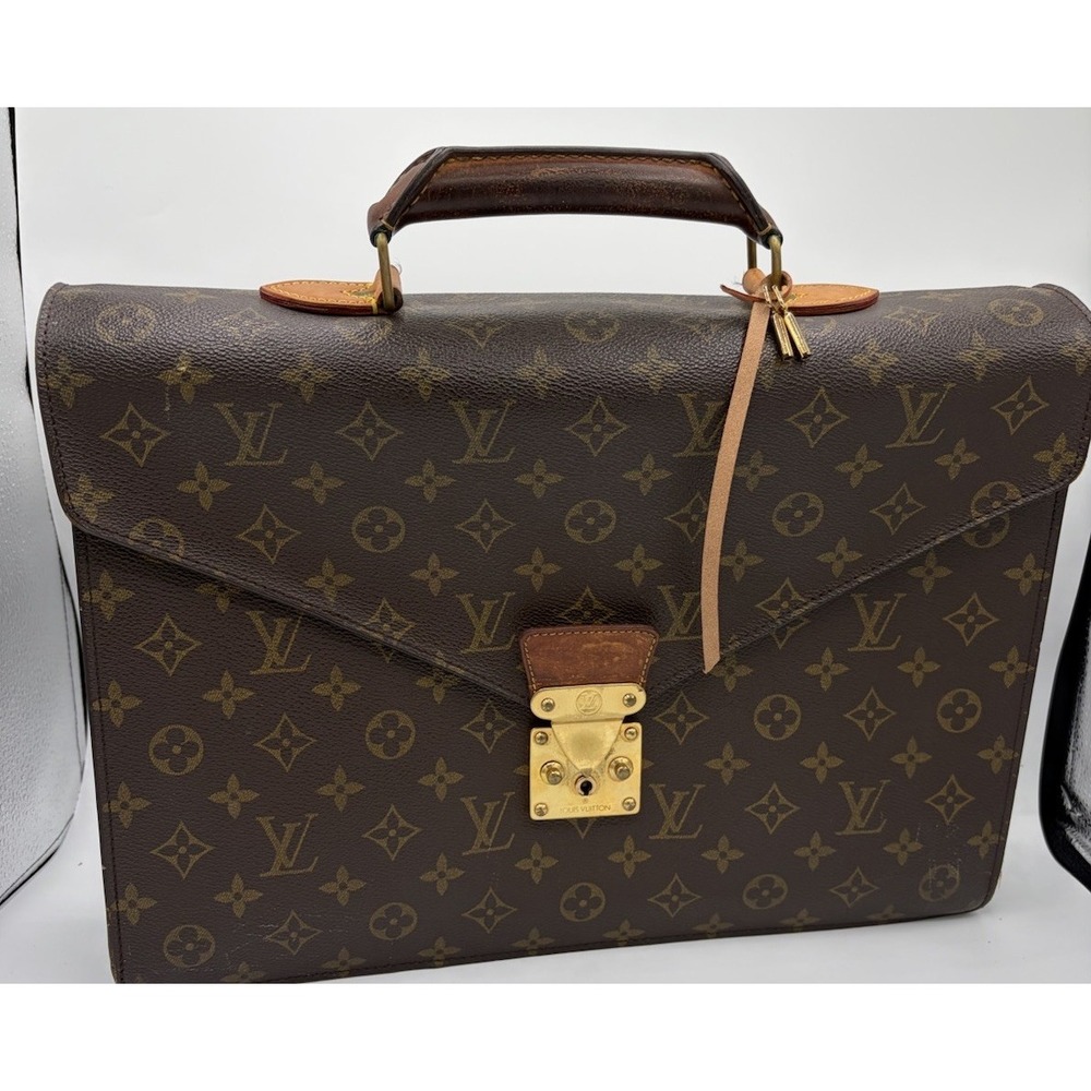 Louis Vuitton Mi0992 Monogram Serviette Conseiller Used With Key